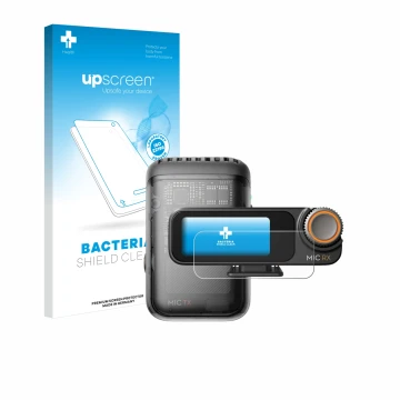 Parte frontal de un envase de producto con el logotipo de la marca upscreen. Al lado se muestra el dispositivo DJI Mic 2 (Rece