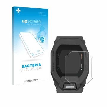 Parte frontal de un envase de producto con el logotipo de la marca upscreen. Al lado se muestra el dispositivo Casio G-Shock G