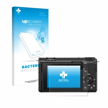 Parte frontal de un envase de producto con el logotipo de la marca upscreen. Al lado se muestra el dispositivo Sony Alpha ZV-E