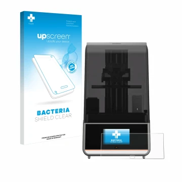 Parte frontal de un envase de producto con el logotipo de la marca upscreen. Al lado se muestra el dispositivo Anycubic Photon