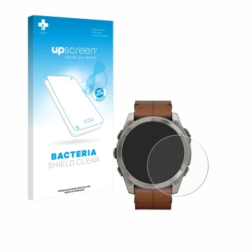 Parte frontal de un envase de producto con el logotipo de la marca upscreen. Al lado se muestra el dispositivo Garmin Fenix 8 