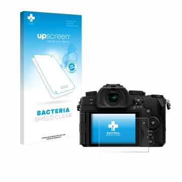 Parte frontal de un envase de producto con el logotipo de la marca upscreen. Al lado se muestra el dispositivo Panasonic Lumix