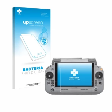 Parte frontal de un envase de producto con el logotipo de la marca upscreen. Al lado se muestra el dispositivo DJI RC Plus 2 c