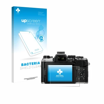 Parte frontal de un envase de producto con el logotipo de la marca upscreen. Al lado se muestra el dispositivo Olympus OM Syst