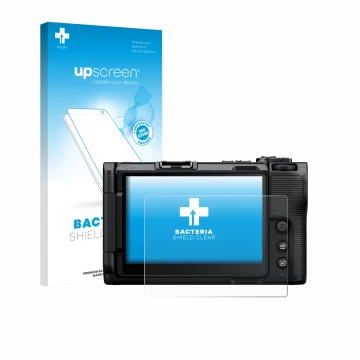 Parte frontal de un envase de producto con el logotipo de la marca upscreen. Al lado se muestra el dispositivo Nikon ZR 2025 c