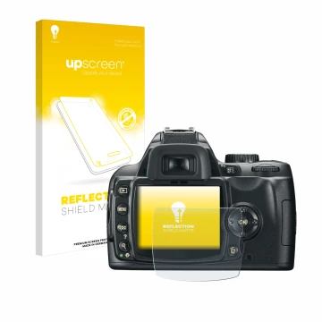 Parte frontal de un envase de producto con el logotipo de la marca upscreen. Al lado se muestra el dispositivo Nikon D60 con s