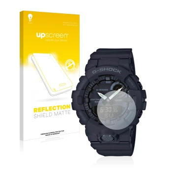 Parte frontal de un envase de producto con el logotipo de la marca upscreen. Al lado se muestra el dispositivo Casio G-Shock G