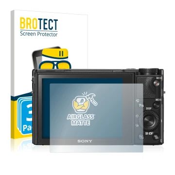 Parte frontal de un envase de producto con el logotipo de la marca BROTECT. Al lado se muestra el dispositivo Sony Cyber-Shot 
