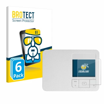 Parte frontal de un envase de producto con el logotipo de la marca BROTECT. Al lado se muestra el dispositivo Canon Selphy CP1