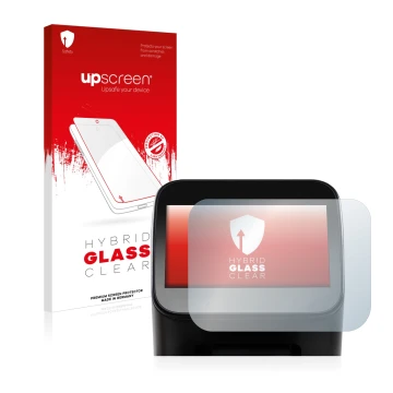 Parte frontal de un envase de producto con el logotipo de la marca upscreen. Al lado se muestra el dispositivo Shaper Origin G