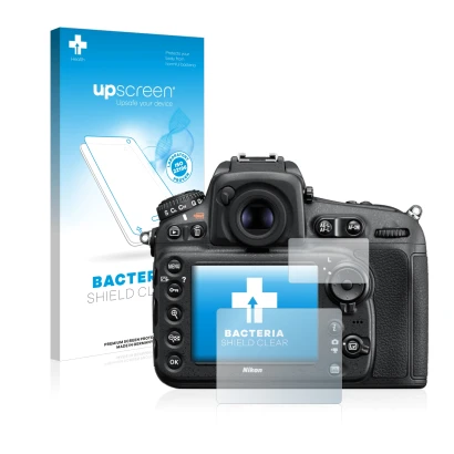 Parte frontal de un envase de producto con el logotipo de la marca upscreen. Al lado se muestra el dispositivo Nikon D810 con