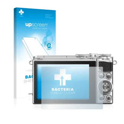 Parte frontal de un envase de producto con el logotipo de la marca upscreen. Al lado se muestra el dispositivo Nikon 1 J5 con 