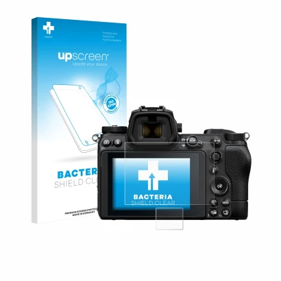 Parte frontal de un envase de producto con el logotipo de la marca upscreen. Al lado se muestra el dispositivo Nikon Z 6 II co