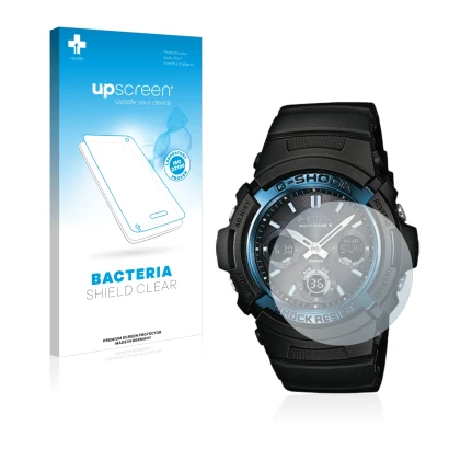 Parte frontal de un envase de producto con el logotipo de la marca upscreen. Al lado se muestra el dispositivo Casio AWG M100