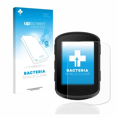 Parte frontal de un envase de producto con el logotipo de la marca upscreen. Al lado se muestra el dispositivo Garmin Edge 840