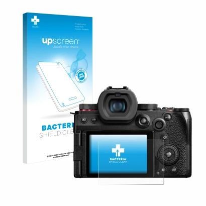 Parte frontal de un envase de producto con el logotipo de la marca upscreen. Al lado se muestra el dispositivo Panasonic Lumix