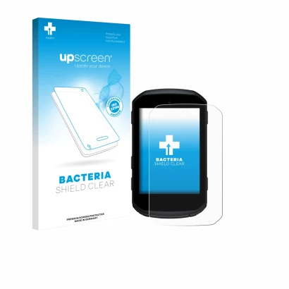 Parte frontal de un envase de producto con el logotipo de la marca upscreen. Al lado se muestra el dispositivo Garmin Edge 850