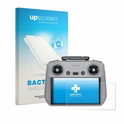 Parte frontal de un envase de producto con el logotipo de la marca upscreen. Al lado se muestra el dispositivo DJI RC 2 2025 c